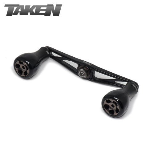 Der Taken AZ100 Handle ist ein schwarzer Power Handle aus Duraluminium mit H7 Knobs fΓΌr Shimano & Daiwa, mit dem Taken Logo auf weiΓem Hintergrund.