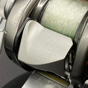 RL - Angelrollentuning - Kakedzuka Design Works Offset Clutch | 23 Metanium, 22 Metanium Shallow Edition, 20 Metanium, 19 Antares, 18 Bantam MGL - Gunmetal -