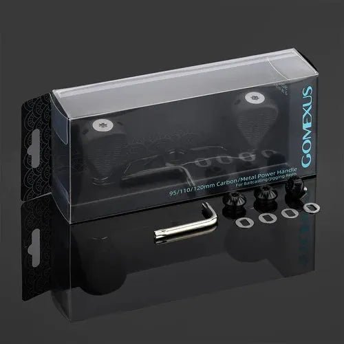 Der Gomexus Power Handle mit Flat Knob 110mm (7x4mm) wird mit seiner Kartonverpackung, einem Metallwerkzeug und Zubehörteilen von Gomexus präsentiert, alles angeordnet auf einer reflektierenden schwarzen Oberfläche.