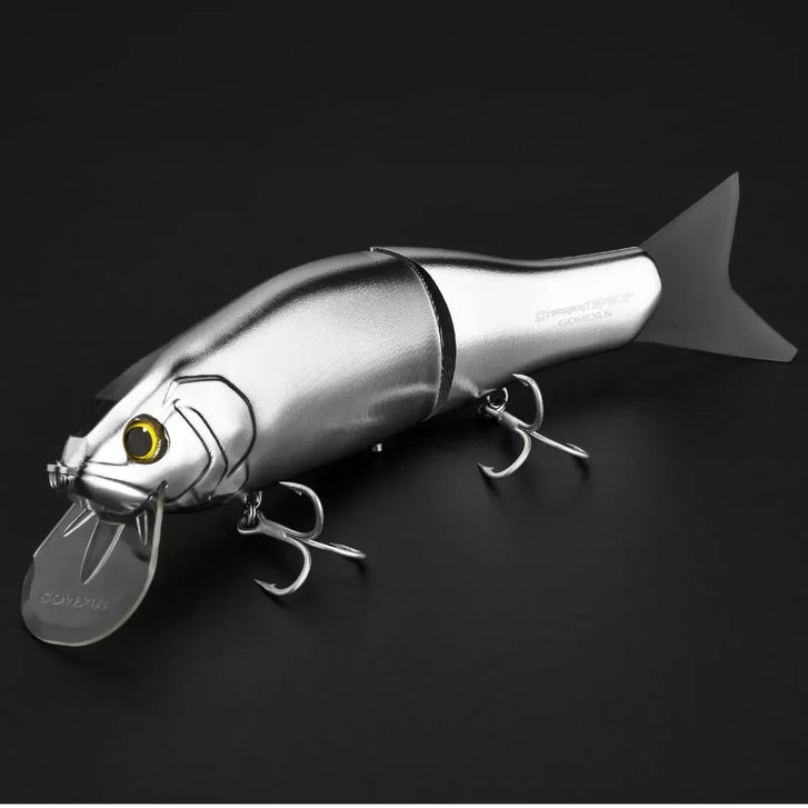 Ein Angelköder in Form eines Fisches mit Metallgelenken, gelben und schwarzen Augen, einer durchsichtigen Kunststofflippe und zwei Drillingshaken auf einer schwarzen Oberfläche.