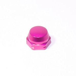 Eine glänzend rosafarbene Avail Shimano Handle Locknut M7 (Rosa) für original Shimano Kurbeln steht auf einem schlichten weißen Hintergrund.