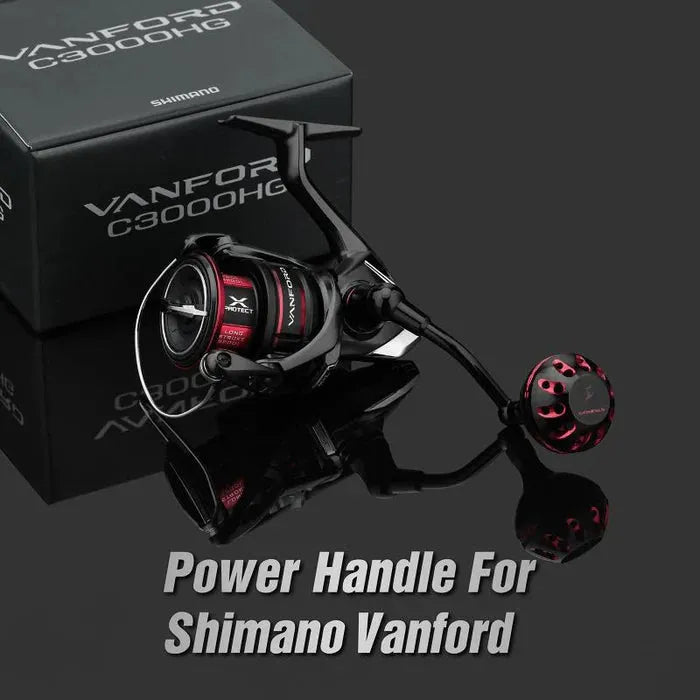 Ein Gomexus Aluminiumgriff in Schwarz und Rot ist vor einer Shimano Vanford C3000HG-Box abgebildet. Der Bildtext lautet: „Power Handle für Shimano Vanford“. Marke: Gomexus. Produkt: Aluminiumgriff für Shimano Vanford.