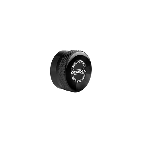 Eine schwarze, runde Gomexus Aluminium-Spulenspannungsknopfkappe mit strukturiertem Griff und weißer Beschriftung ist perfekt für Ihre Spulenbremsenkappen und passt ideal zu jedem Gomexus-Baitcasterrollen-Setup.