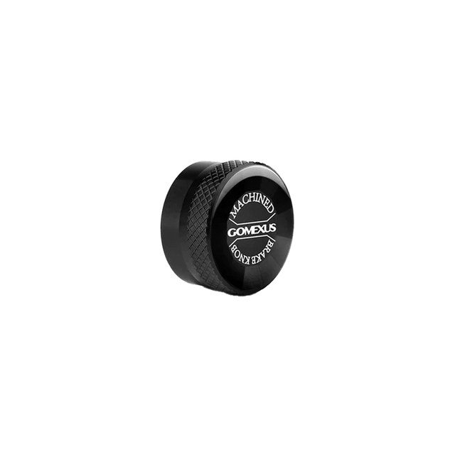 Eine schwarze, runde Gomexus Aluminium-Spulenspannungsknopfkappe mit strukturiertem Griff und weißer Beschriftung ist perfekt für Ihre Spulenbremsenkappen und passt ideal zu jedem Gomexus-Baitcasterrollen-Setup.
