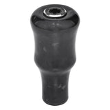 Der Gomexus Carbon Forged F24 Knob von Gomexus ist ein schwarzer, zylindrischer Schaltknauf mit ergonomischem Design und einem metallischen runden Oberteildetail aus geschmiedetem Carbon, abgebildet vor einem weißen Hintergrund.