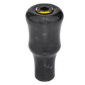 Der Gomexus Carbon Forged F24 Knob von Gomexus ist ein glänzend schwarzer zylindrischer Schaltknauf mit leicht konischem Mittelteil, ergonomischem Design und einem kreisförmigen metallischen Akzent oben in der Mitte.