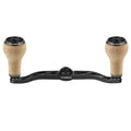 A Gomexus Kurbel 100mm Handgriff mit 27 mm Kork-Knobs (8x5mm) in Schwarz mit zwei hellbraunen Kork-Knobs, abgebildet vor weißem Hintergrund.