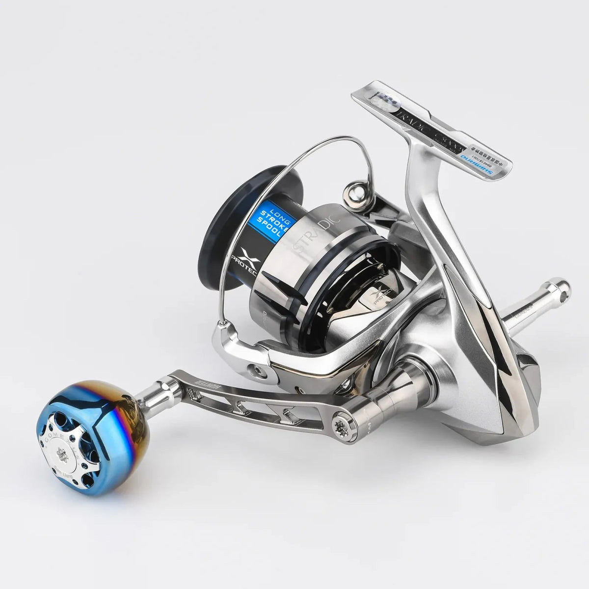 RL - Angelrollentuning - Gomexus Super - Duraluminium - Kurbel 70 mm mit 38 mm Titan Galaxy Knob für Stationärrollen - Handle - Silber - 70 mm - Daiwa