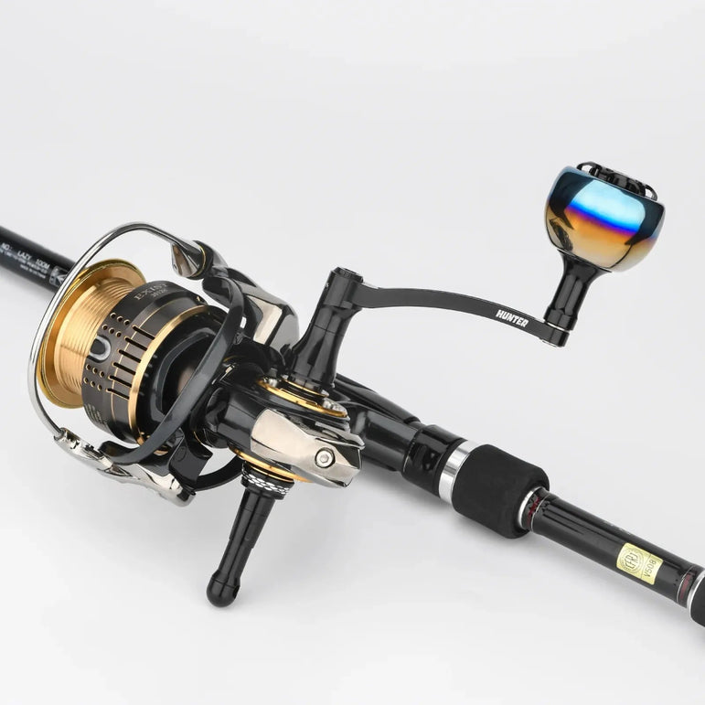 RL - Angelrollentuning - Gomexus Super - Duraluminium - Kurbel 70 mm mit 38 mm Titan Galaxy Knob für Stationärrollen - Handle - Schwarz - 70 mm - Daiwa