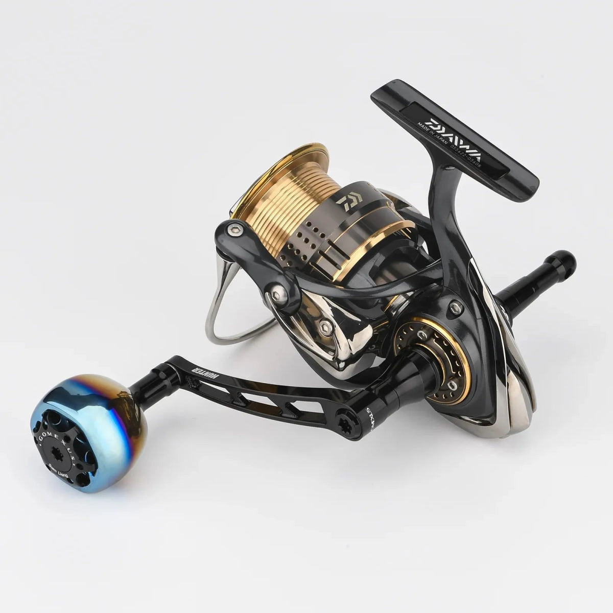 RL - Angelrollentuning - Gomexus Super - Duraluminium - Kurbel 70 mm mit 38 mm Titan Galaxy Knob für Stationärrollen - Handle - Schwarz - 70 mm - Daiwa