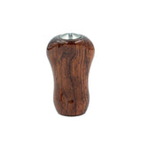 Der Pletry Premium Naturholz Small Gourd Knob in Bubinga weist eine natürliche Holzmaserung und einen Metalleinsatz auf und bietet eine elegante Aufwertung für Ihren Angelrollen Knauf oder Kurbelknauf. Abgebildet vor einem weißen Hintergrund.