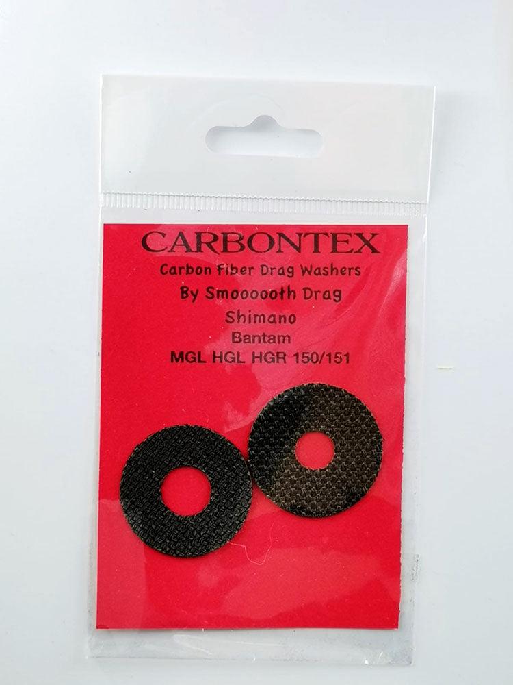 In einer Kunststoffverpackung befinden sich zwei schwarze Carbontex Bremsscheiben für Shimano Baitcasterrollen von Smoothdrag, die auf einer roten Karte mit der Aufschrift 