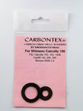 Ein Paket mit der Aufschrift Smoothdrag Bremsscheiben Carbontex für Shimano Baitcasterrolle, mit zwei schwarzen Scheiben auf einer rosafarbenen Karte, auf der Produktkompatibilität und Bremskraftdetails angegeben sind.